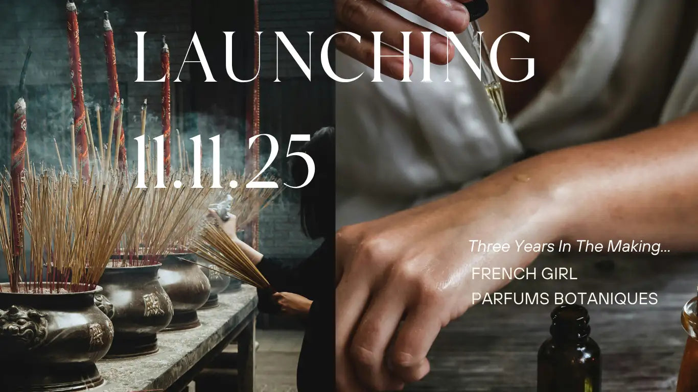 Botanically inspired perfume bottle with a glass stopper and silver cap, featuring botanical illustrations on the label.